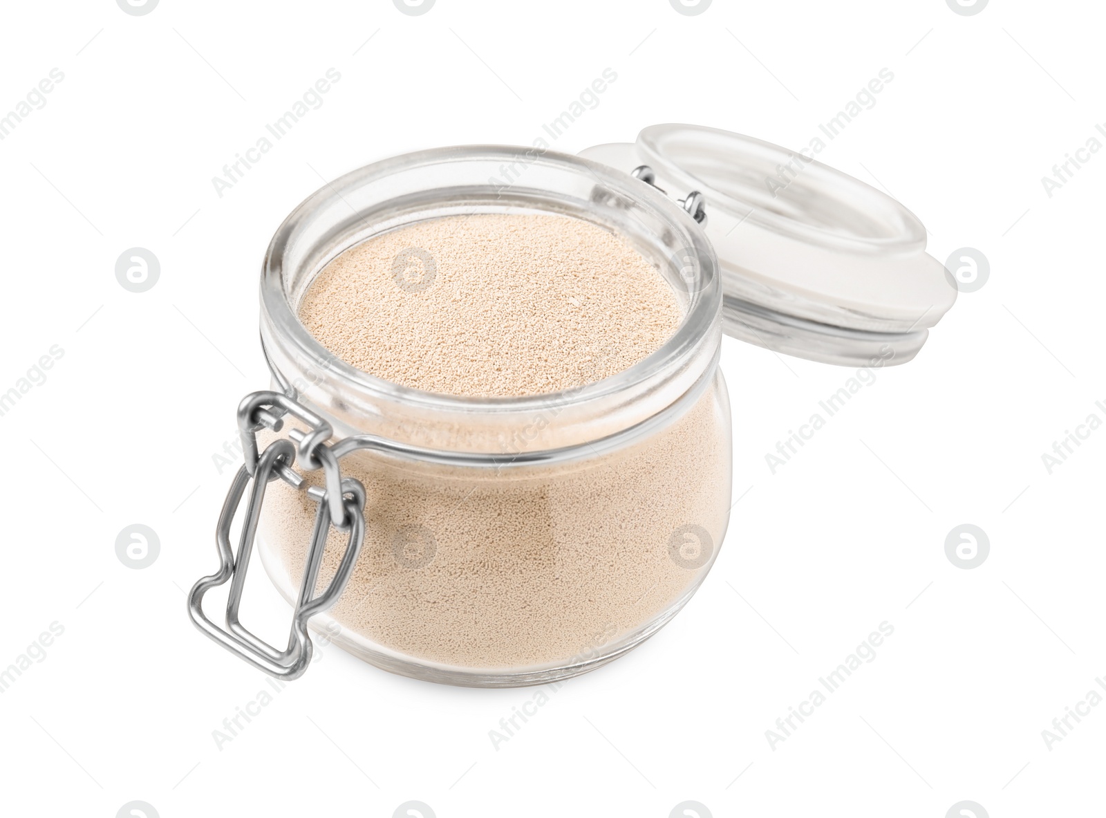 Photo of Granulated yeast in glass jar isolated on white