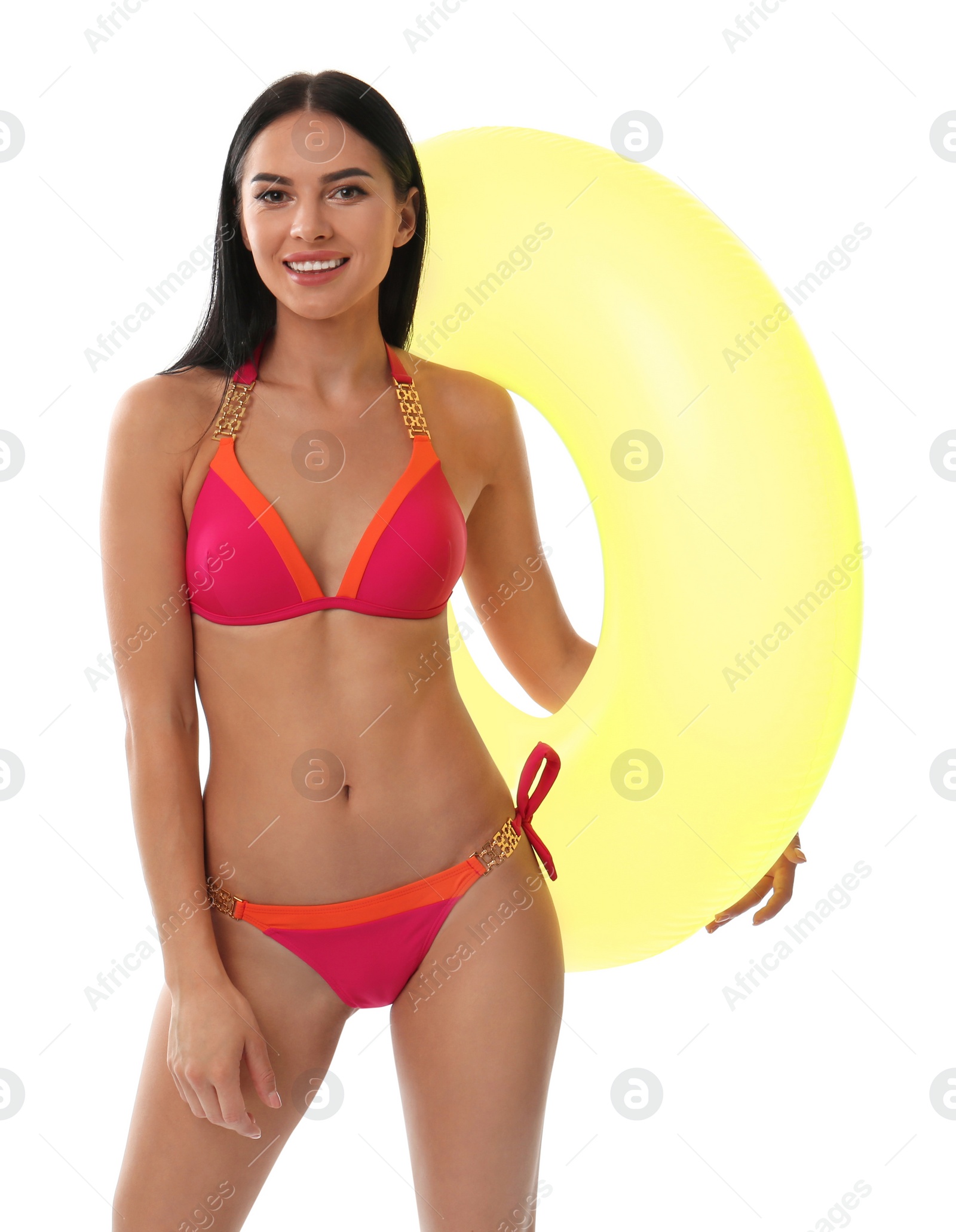 Photo of Beautiful young woman in stylish bikini with inflatable ring on white background