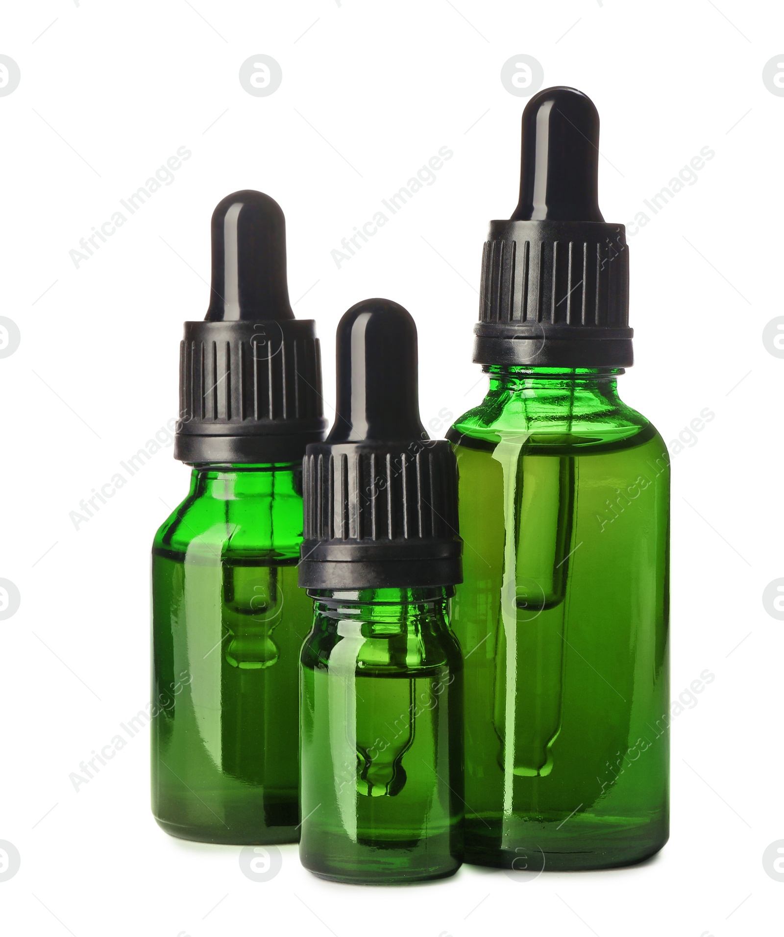 Photo of Cosmetic bottles of essential oils on white background