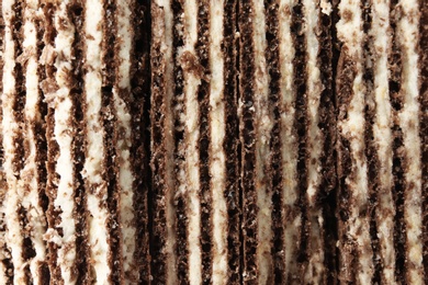 Photo of Closeup view of tasty wafer sticks as background. Sweet food