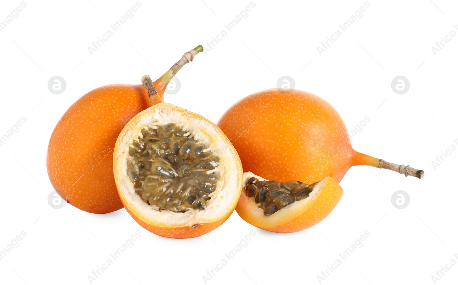 Photo of Whole and cut delicious ripe granadillas on white background