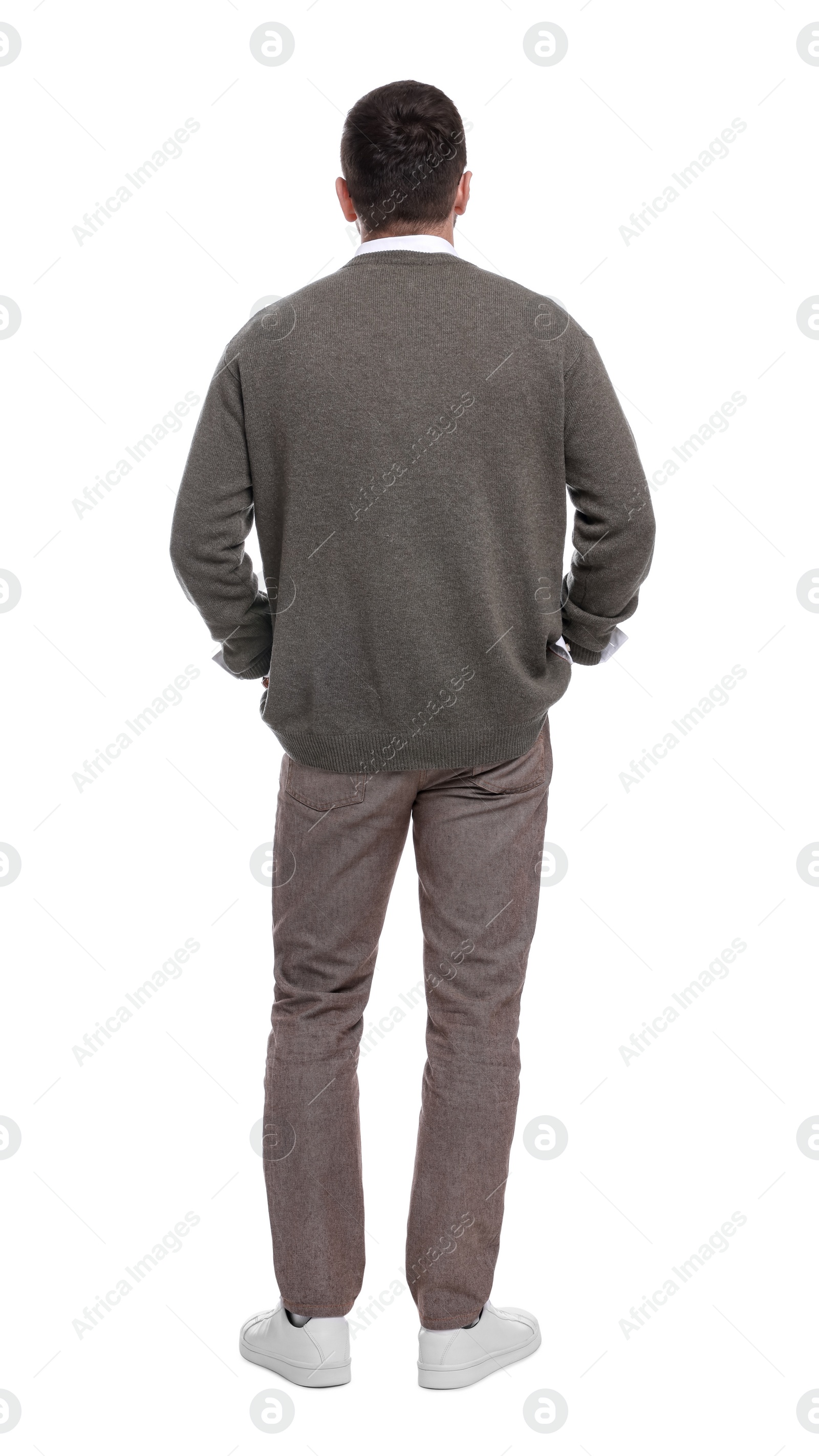 Photo of Businessman standing on white background, back view
