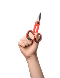 Photo of Man holding scissors isolated on white, closeup