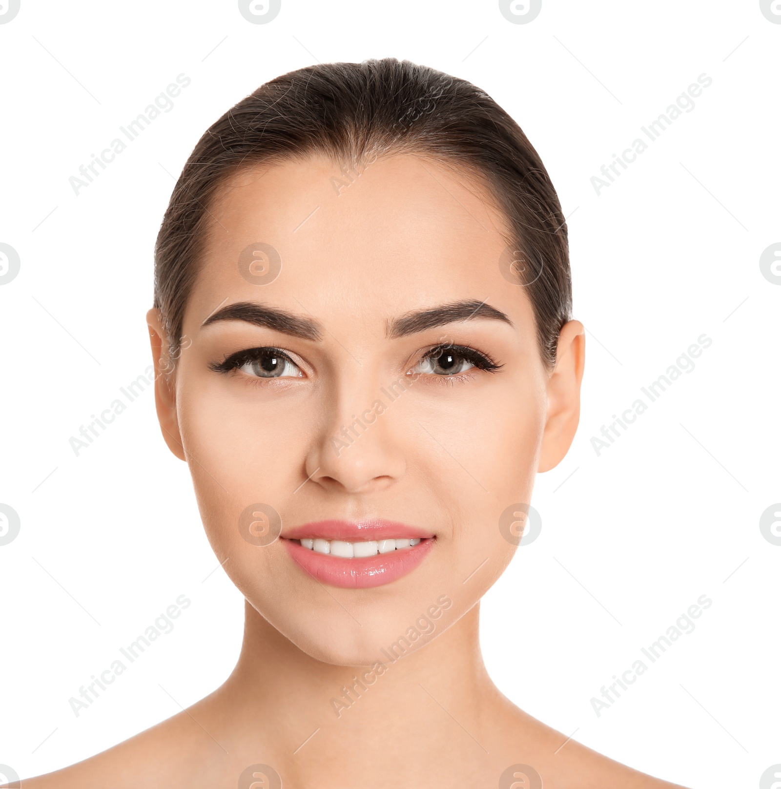 Photo of Young woman with beautiful makeup on white background. Professional cosmetic products