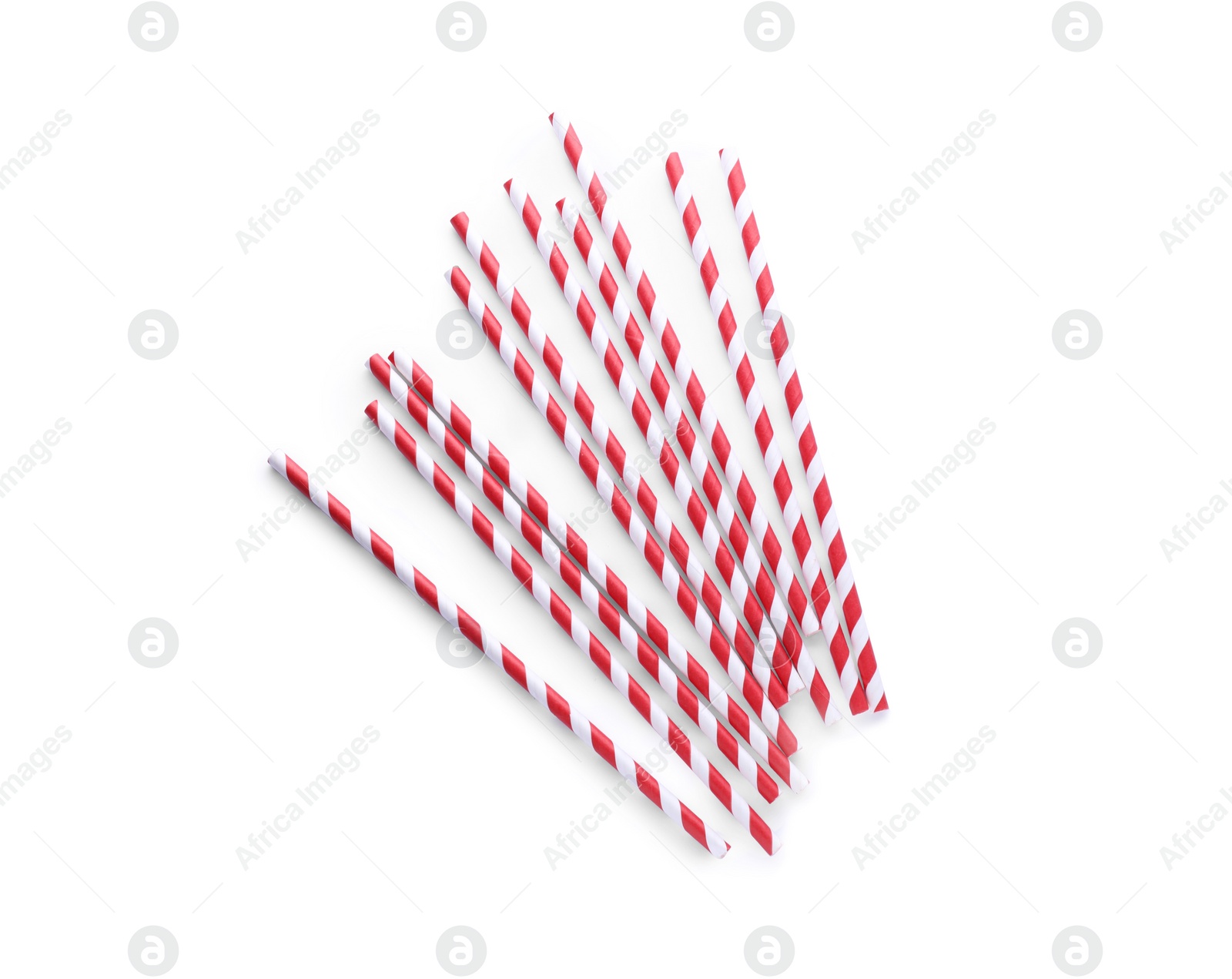 Photo of Striped paper cocktail straws on white background, top view