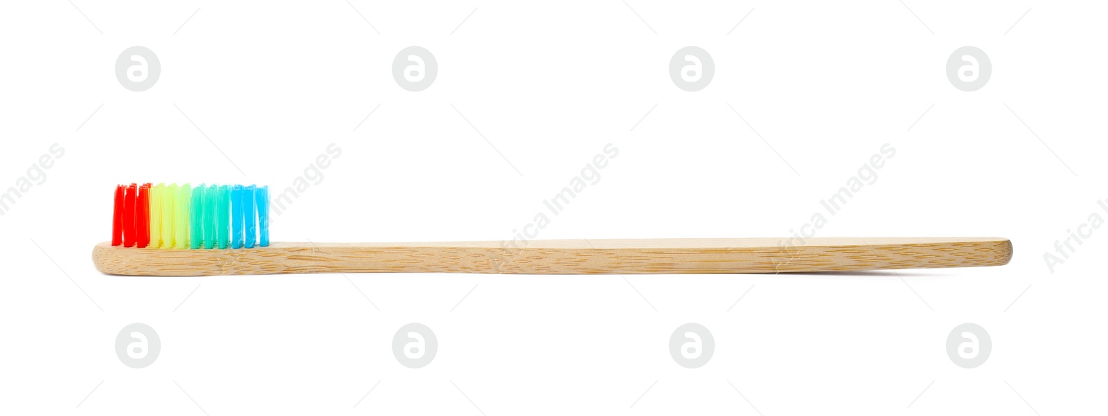 Photo of Toothbrush made of bamboo on white background