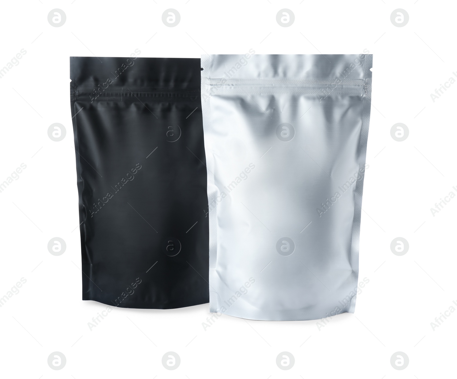 Photo of Different blank foil packages isolated on white