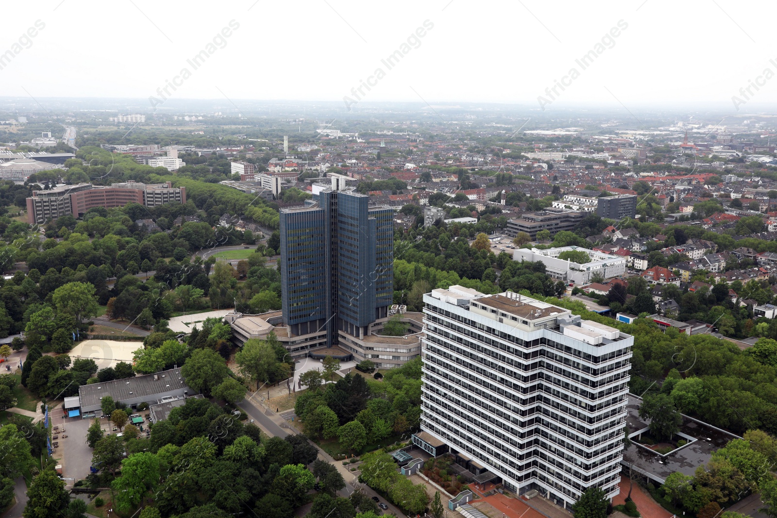 Photo of View of beautiful city with buildings and trees