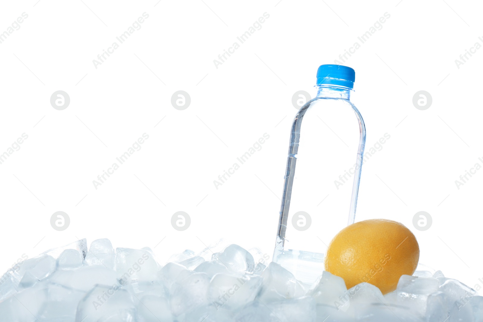 Photo of Bottle of water and lemon on ice cubes against white background