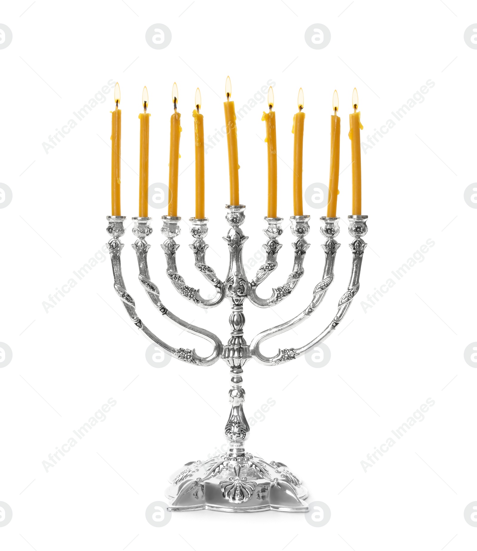 Photo of Silver menorah with burning candles on white background. Hanukkah celebration