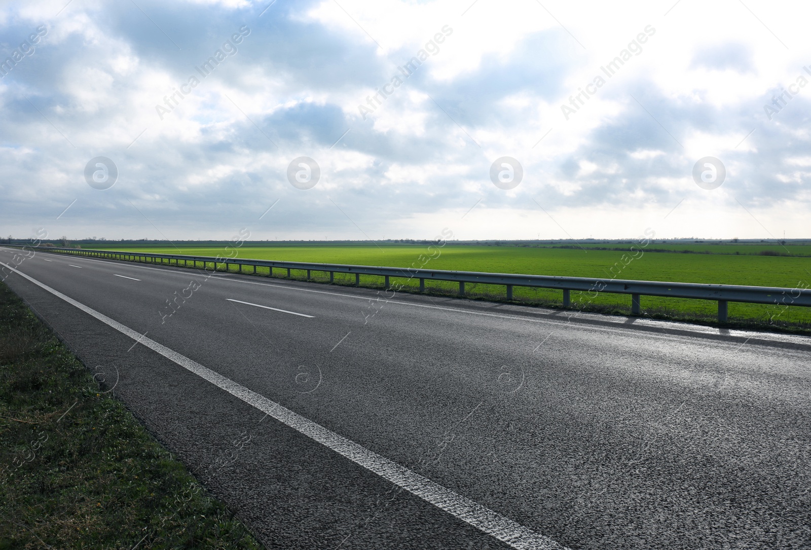 Photo of Beautiful view of asphalt highway without transport