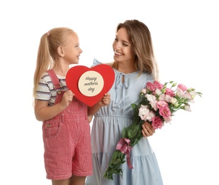 Photo of Little daughter congratulating her mom with card on white background. Happy Mother's Day