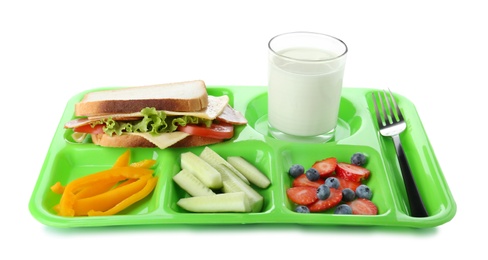 Photo of Serving tray with healthy food on white background. School lunch