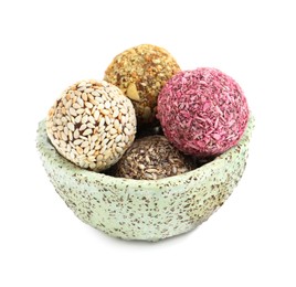 Photo of Different delicious vegan candy balls and almonds on white background