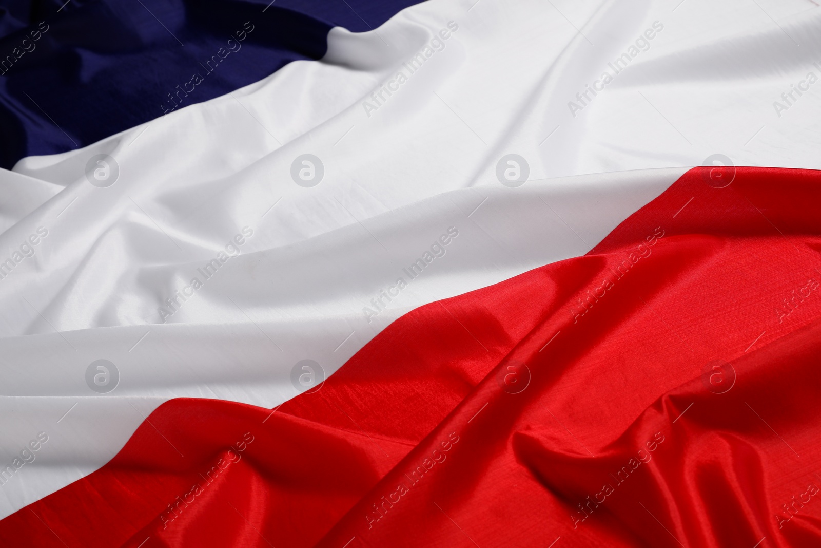 Photo of Flag of France as background, closeup. National symbol