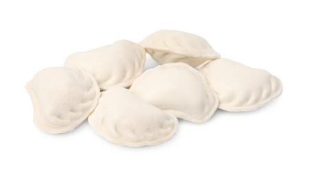 Photo of Raw dumplings (varenyky) isolated on white. Ukrainian cuisine