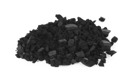 Photo of Pile of crushed activated charcoal pills on white background. Potent sorbent
