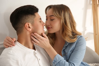 Photo of Lovely couple enjoying time together at home