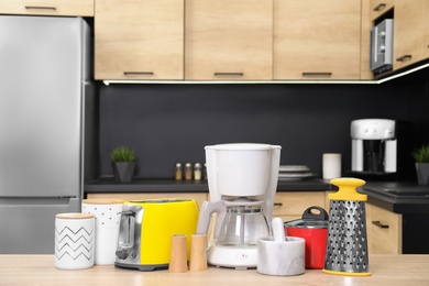 Set with modern domestic appliances in kitchen