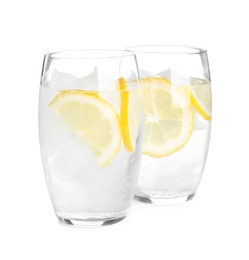 Photo of Soda water with lemon slices and ice cubes on white background