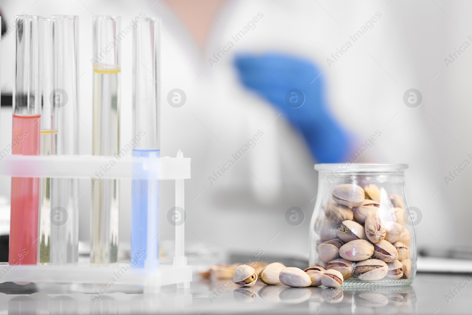 Photo of Pistachios on table in laboratory. Food quality control