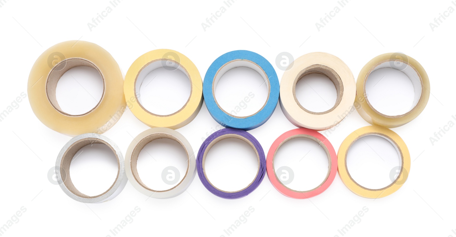 Photo of Many different rolls of adhesive tape on white background, top view