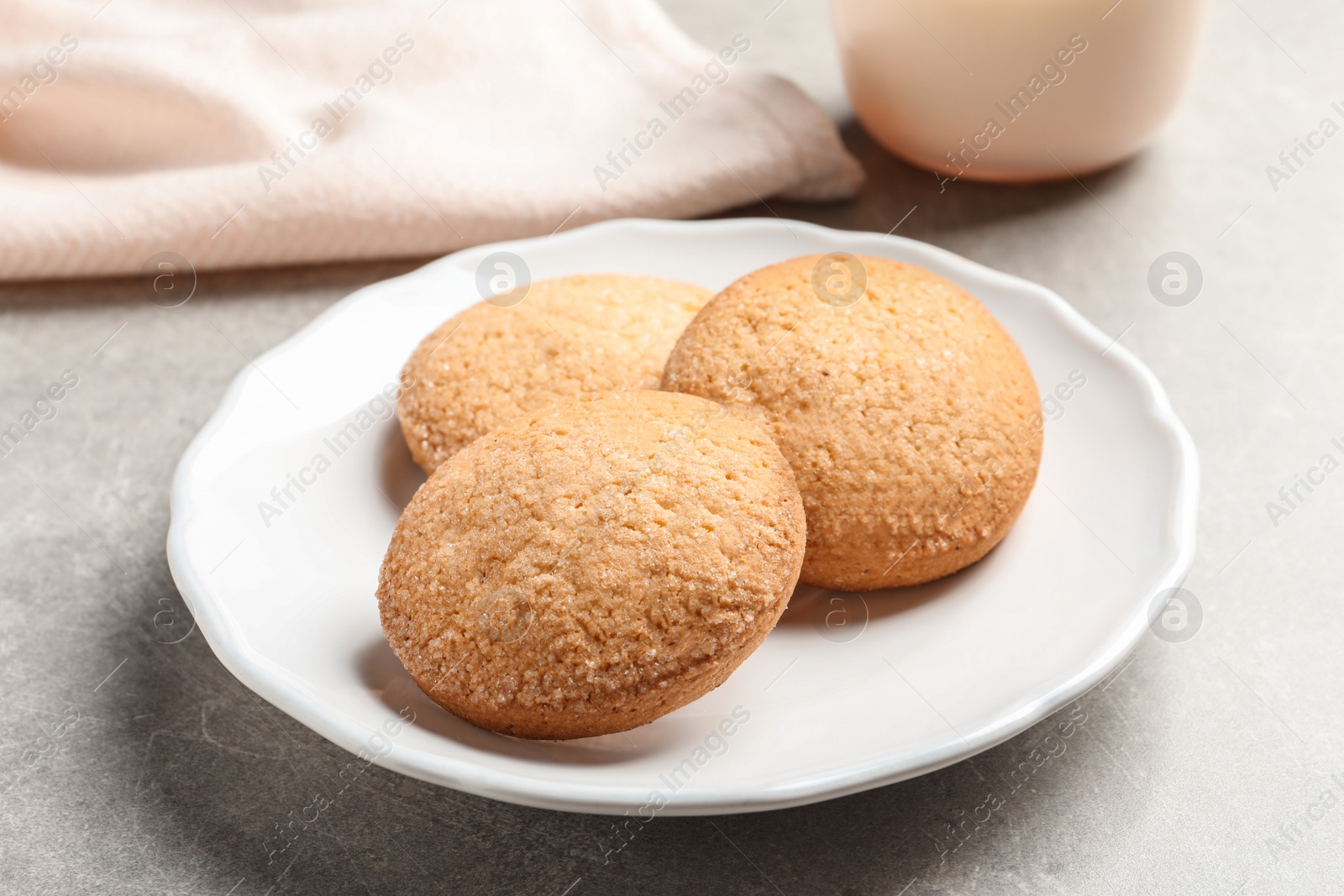 Photo of Plate with Danish butter cookies on table