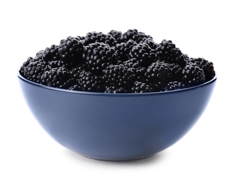 Photo of Blue bowl of tasty ripe blackberries on white background