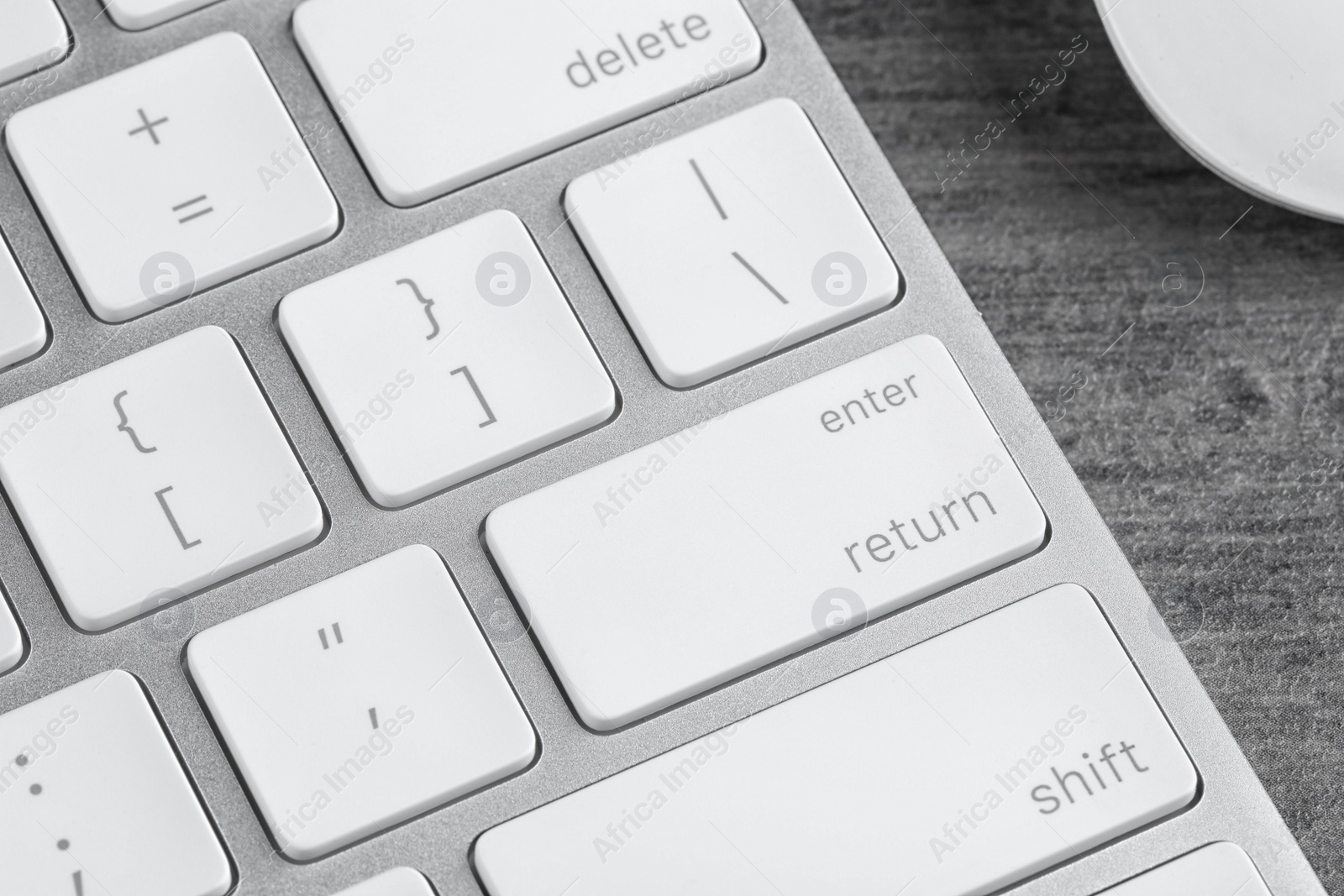 Photo of Modern computer keyboard on table, closeup view