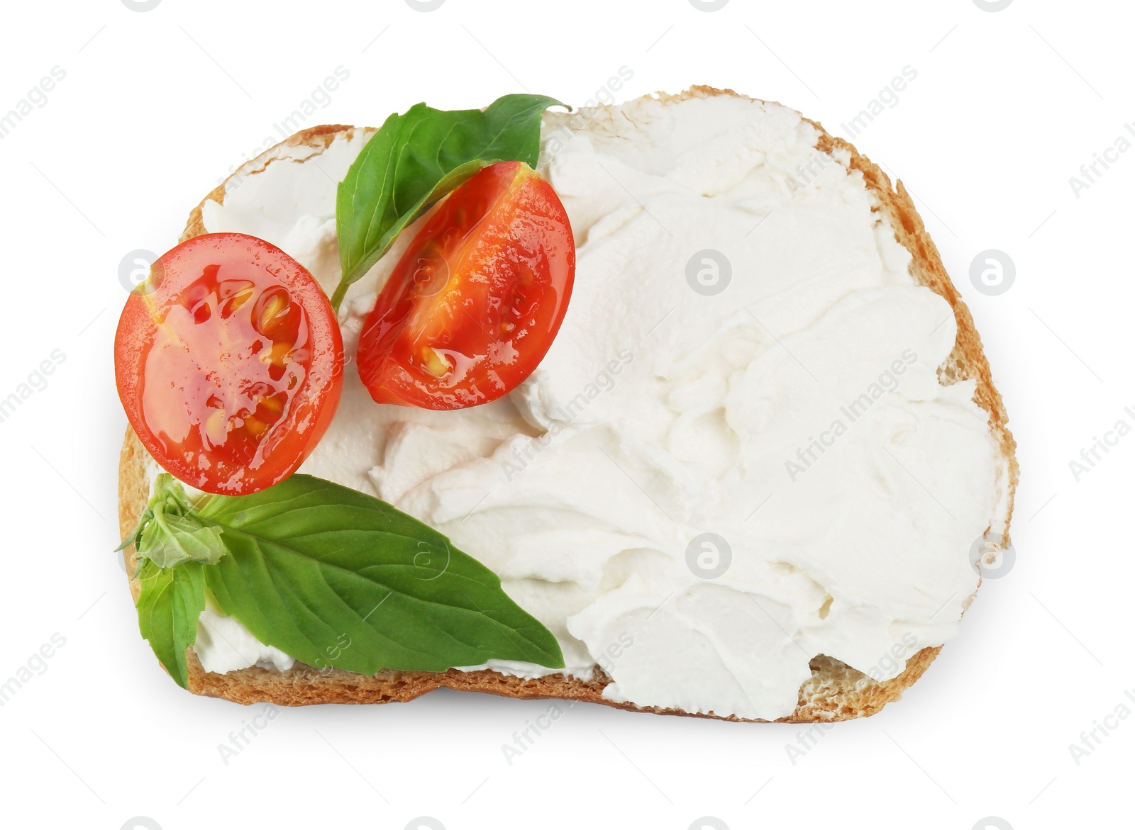 Photo of Bread with cream cheese, tomato and basil leaves isolated on white, top view