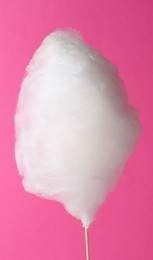 One sweet cotton candy on pink background