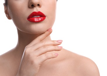 Photo of Closeup view of woman with beautiful full lips on white background