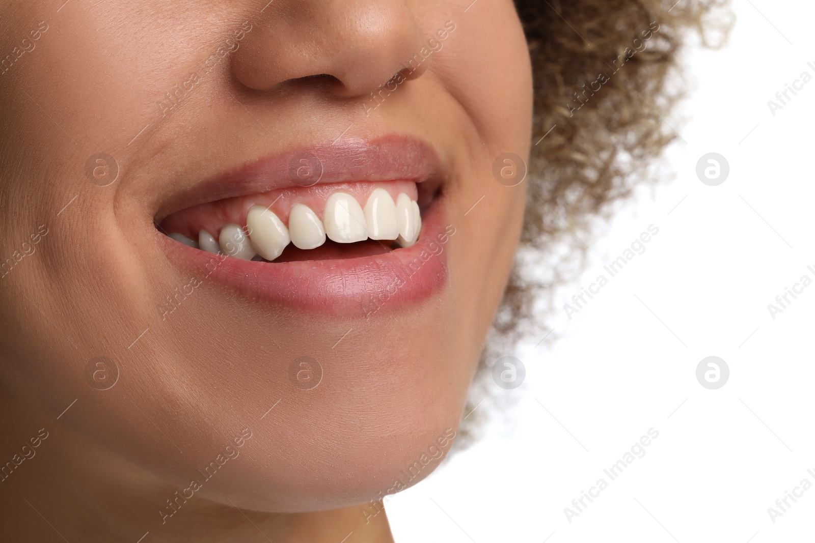 Photo of Woman with clean teeth smiling on white background, closeup