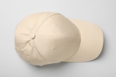 Photo of Baseball cap on white background, top view. Mock up for design