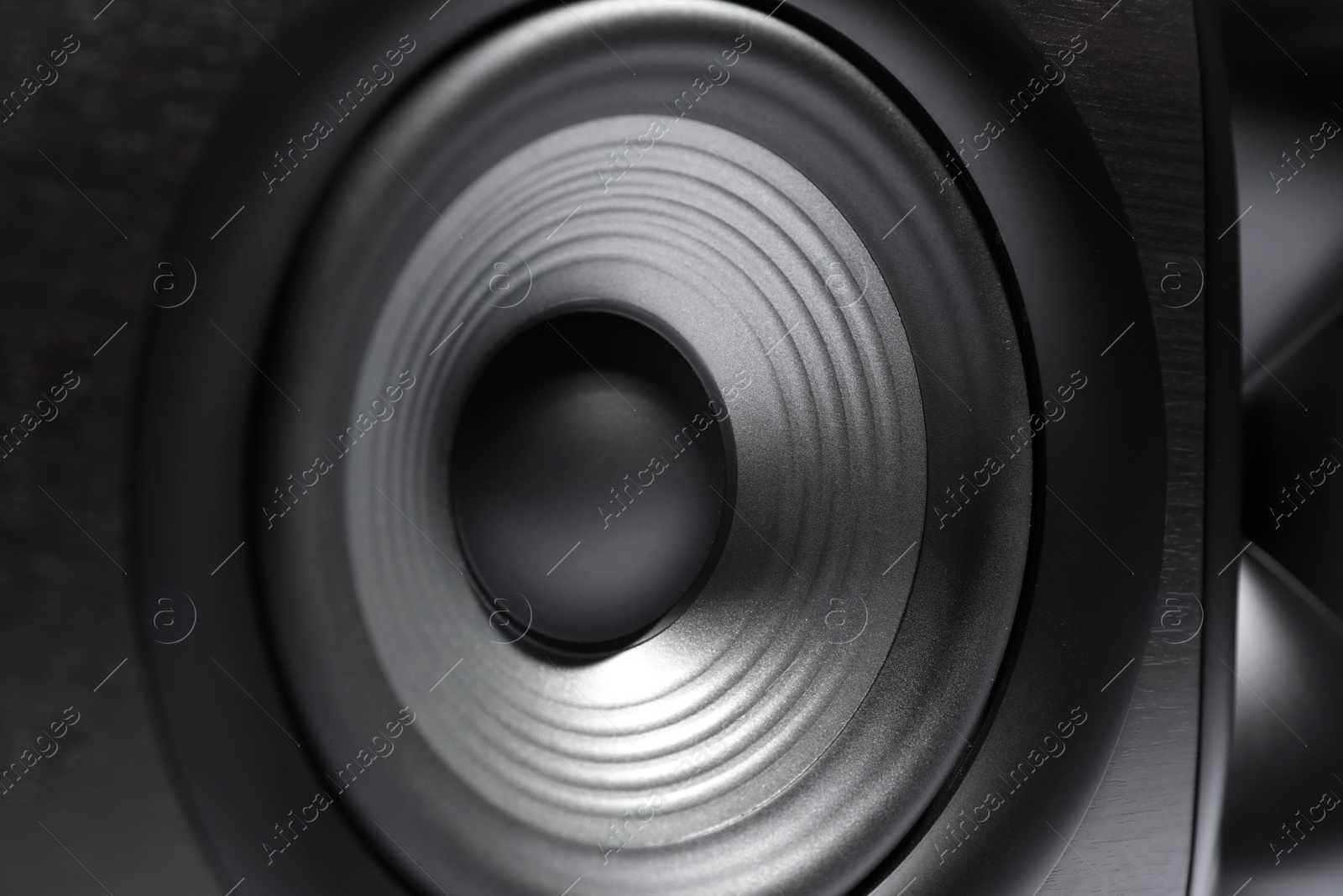 Photo of One wooden sound speaker as background, closeup