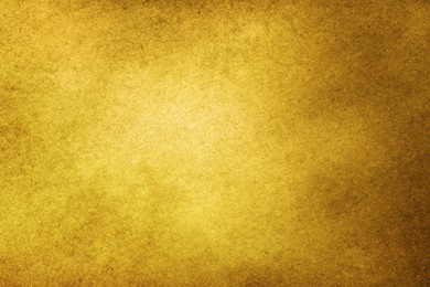 Image of Golden textured surface as background, closeup view