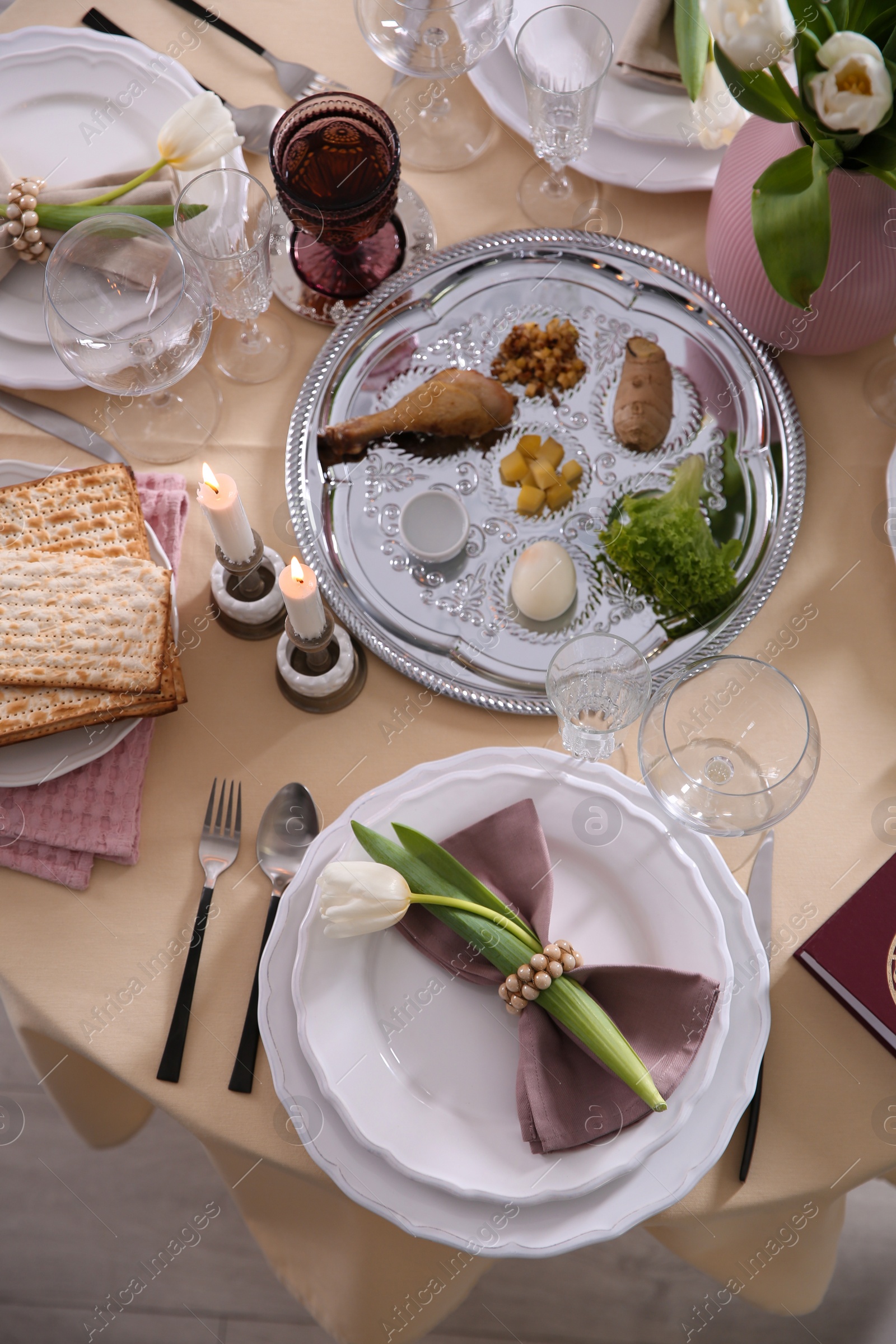 Photo of Festive Passover table setting, top view. Pesach celebration