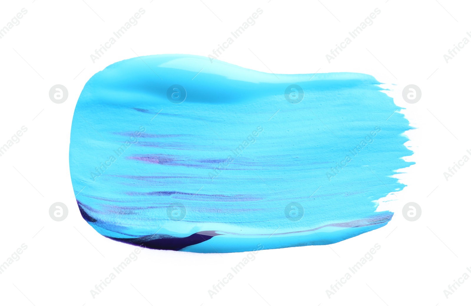 Photo of Abstract brushstroke of mixed blue paint isolated on white