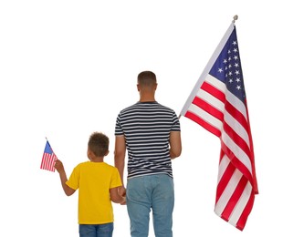 Photo of 4th of July - Independence Day of USA. Man and his son with American flags on white background, back view