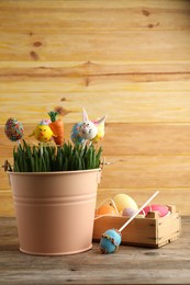 Photo of Delicious sweet cake pops on wooden table. Easter holiday