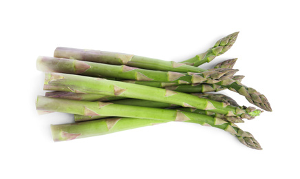 Photo of Fresh raw asparagus isolated on white, top view. Healthy eating