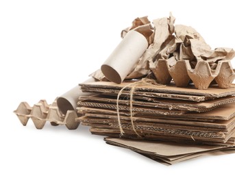 Stack of different waste paper on white background, closeup