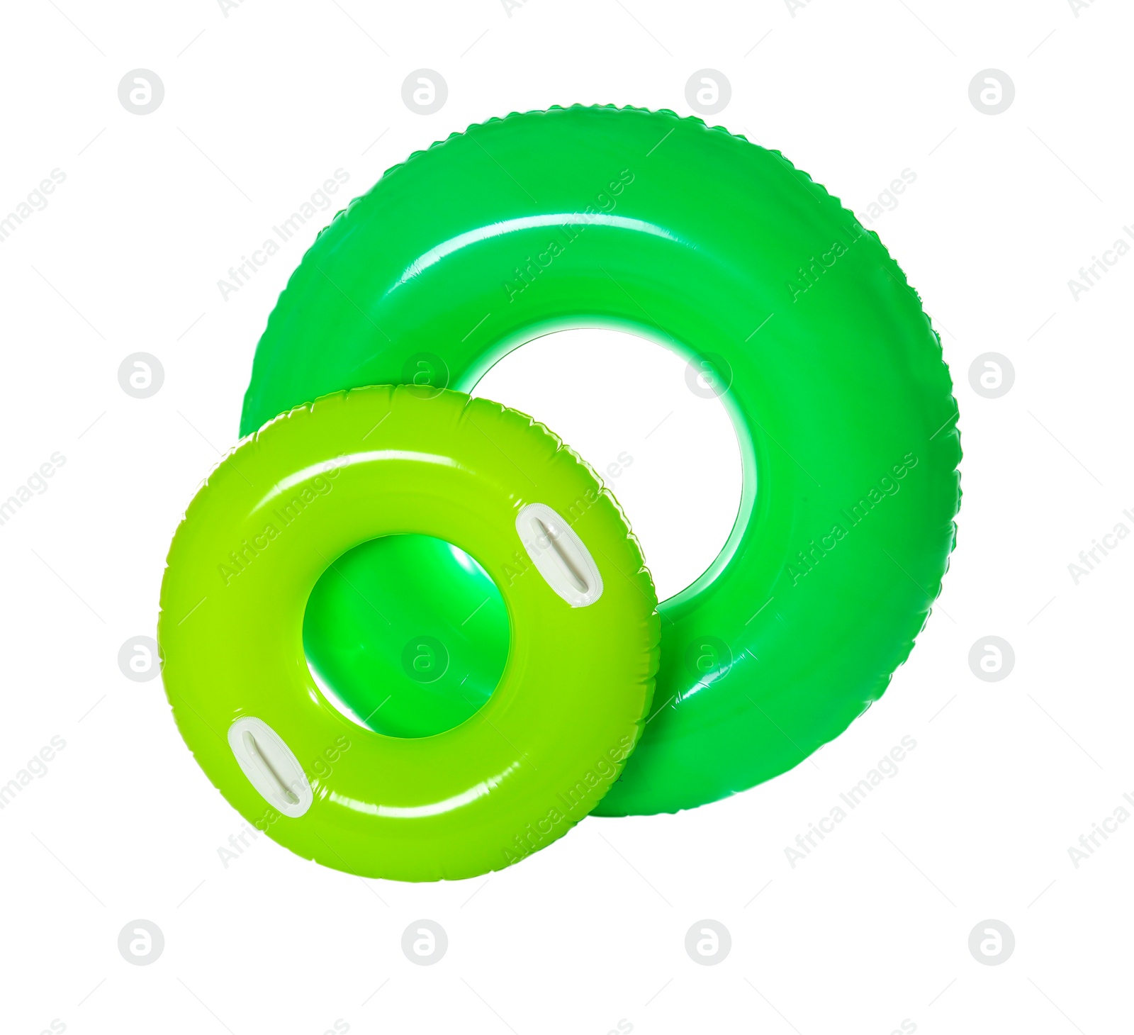 Photo of Different inflatable rings on white background. Summer holidays