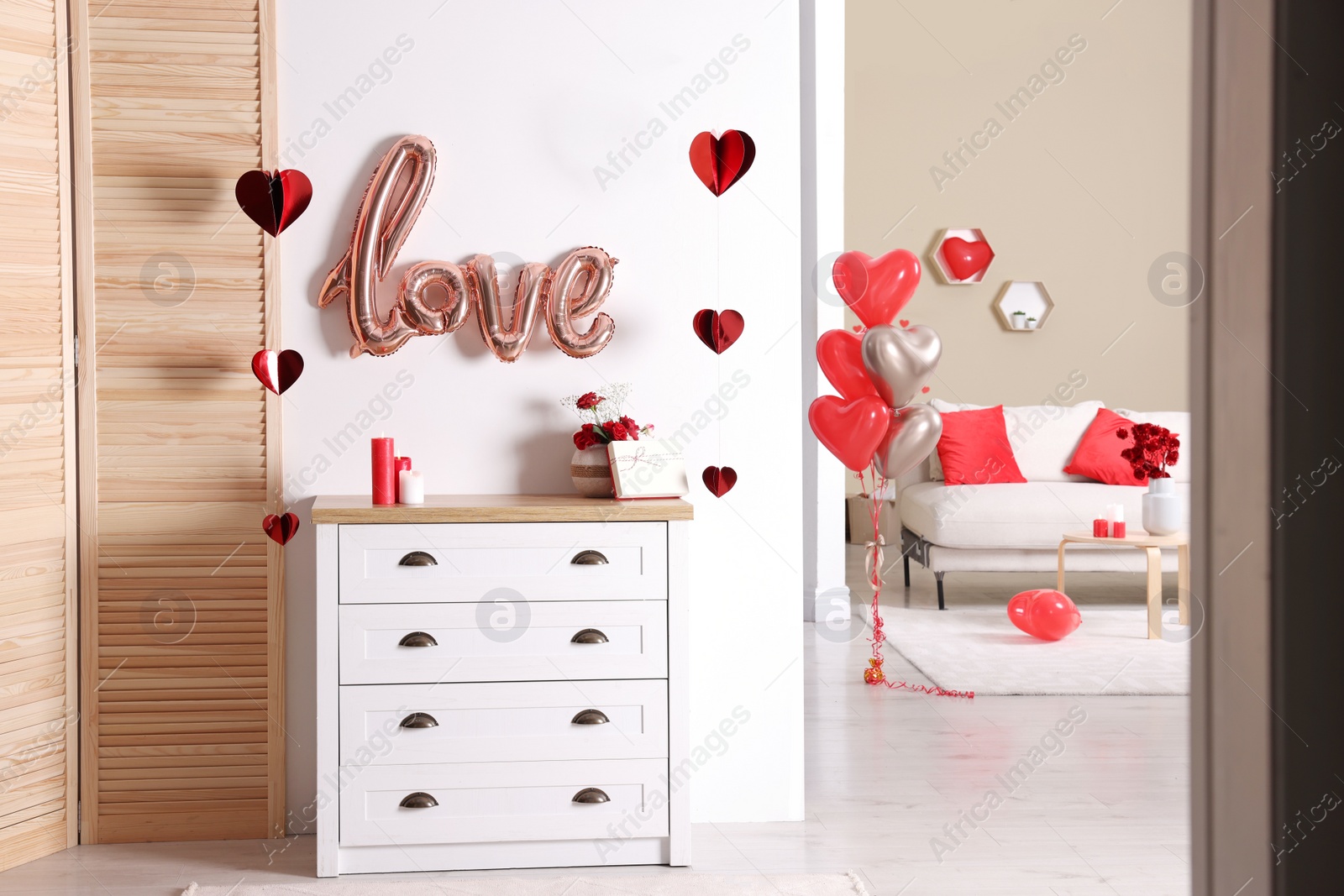 Photo of Cozy room decorated for Valentine's Day. Interior design