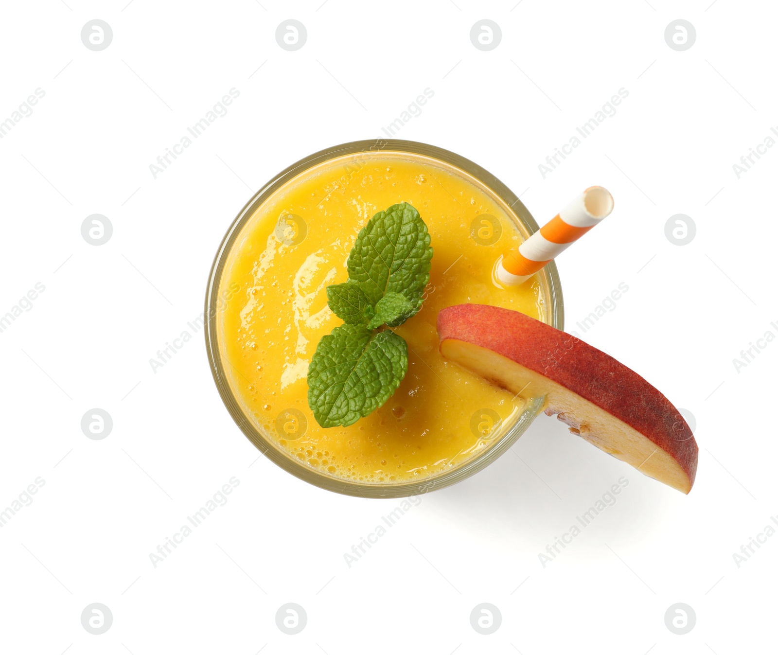 Photo of Glass of tasty peach smoothie isolated on white, top view