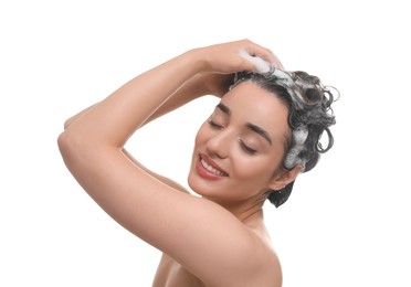 Photo of Beautiful happy woman washing hair on white background