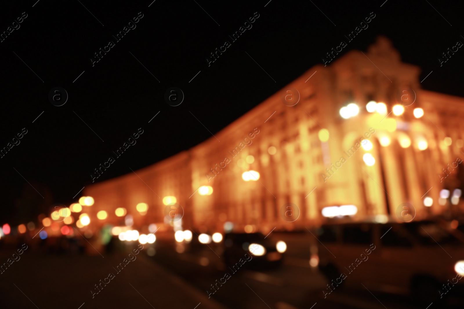 Photo of Blurred view of night cityscape with bokeh effect
