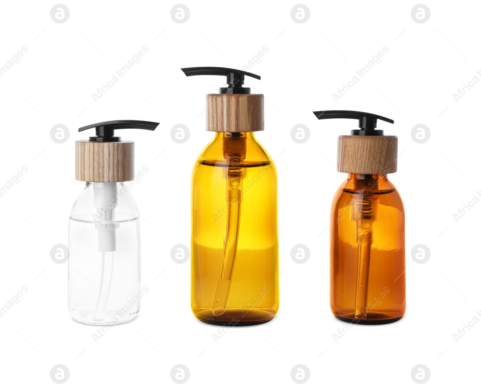 Photo of Bottles with dispenser caps on white background