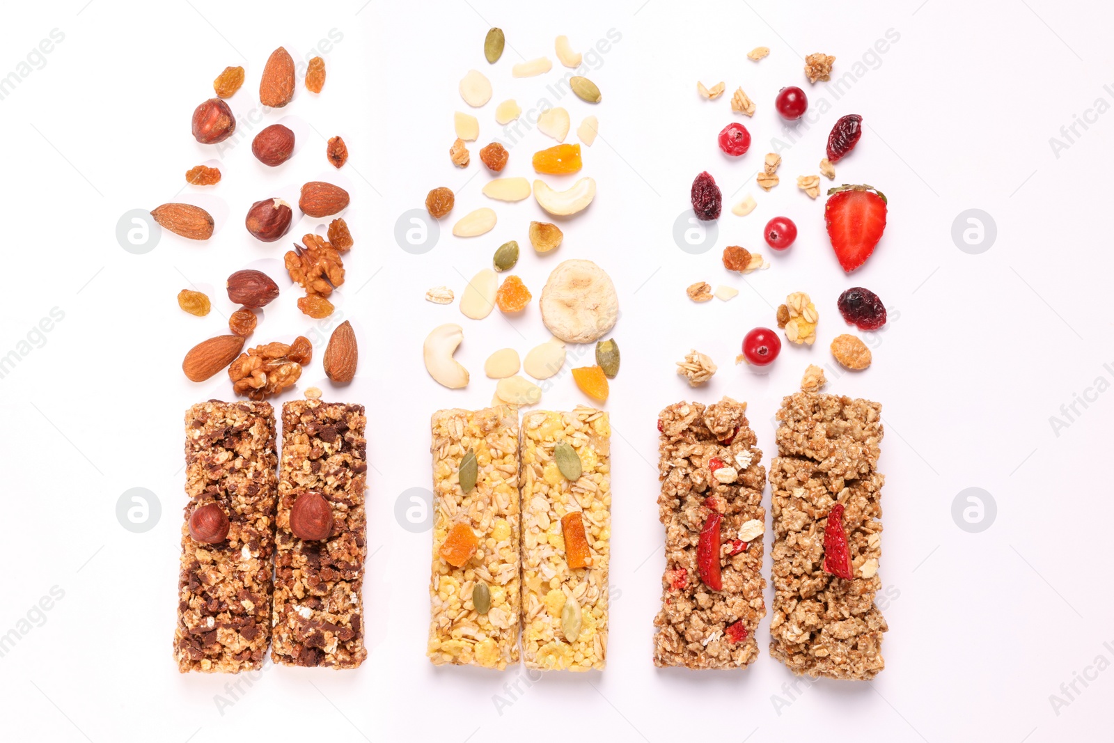 Photo of Different tasty granola bars and ingredients isolated on white, top view