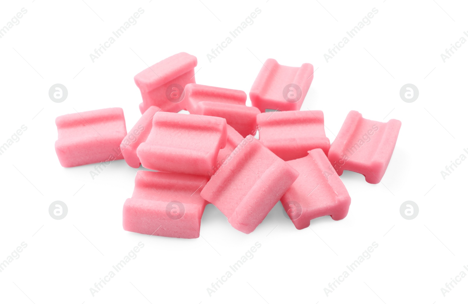 Photo of Pile of tasty pink chewing gums on white background